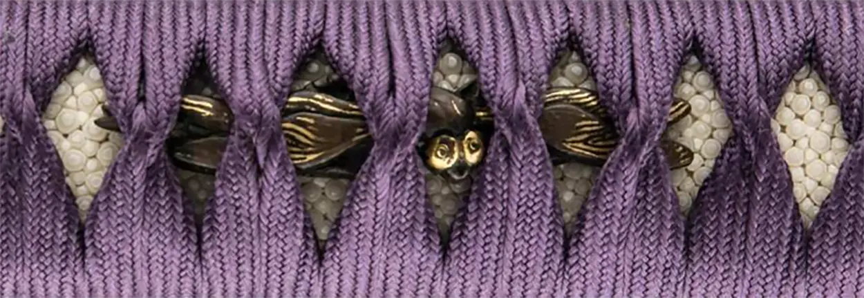 Détail Menuki Tombo