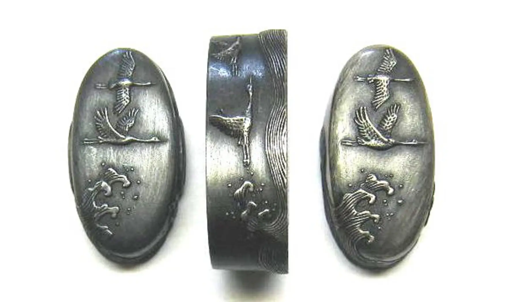 Fuchi-Kashira-Kojiri Vague et grue